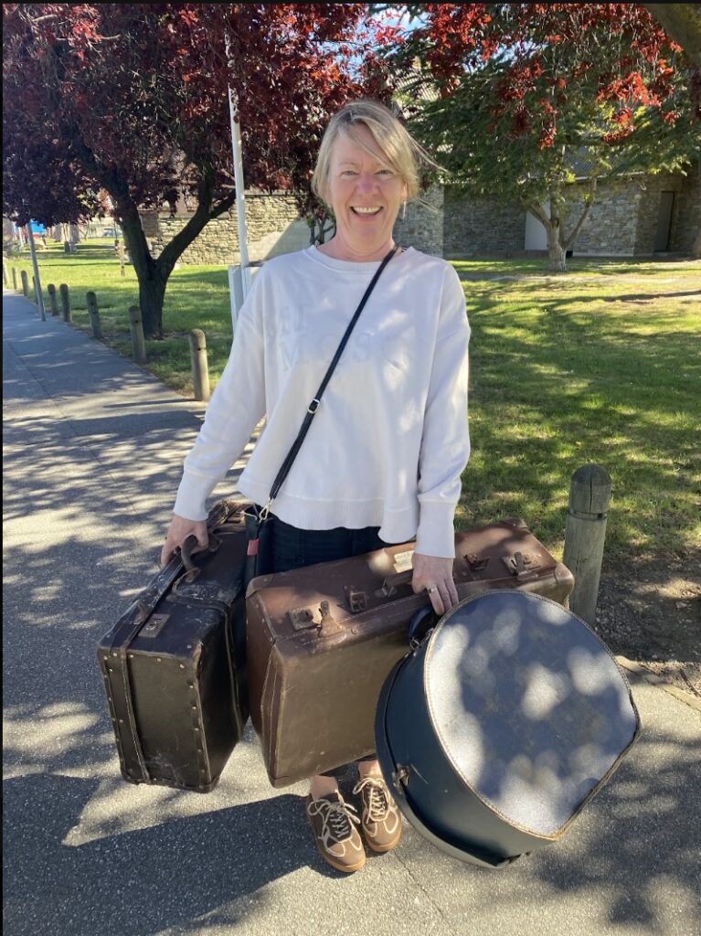 Trustee Rebekah de Jong with suitcase donations in Alexandra